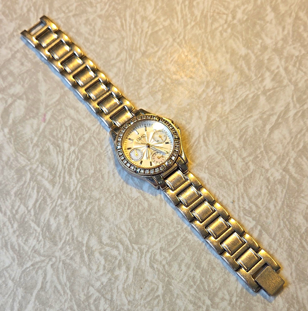 DMQ CZ Women’s Quartz Analog Wristwatch Silver Tone Bracelet Gem-Set Bezel 100m